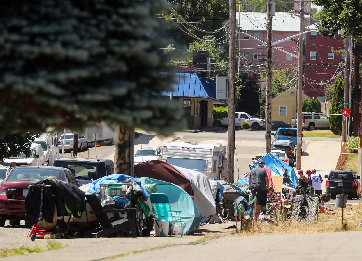 An encampment lines MLK Way in Bremerton on Friday, June 30, 2023.