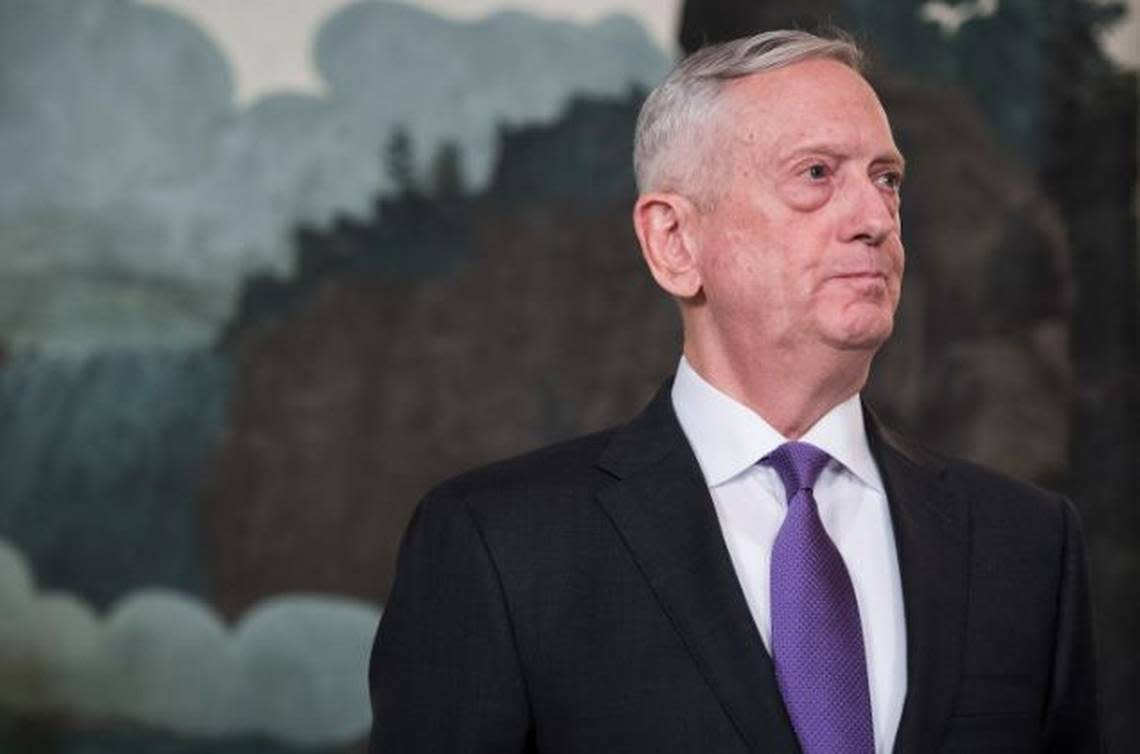 Defense Secretary Jim Mattis listens in March 2018 as President Donald Trump speaks at the White House. Mattis did not publicly reveal his consulting job for the UAE when he returned to the Pentagon in January 2017.