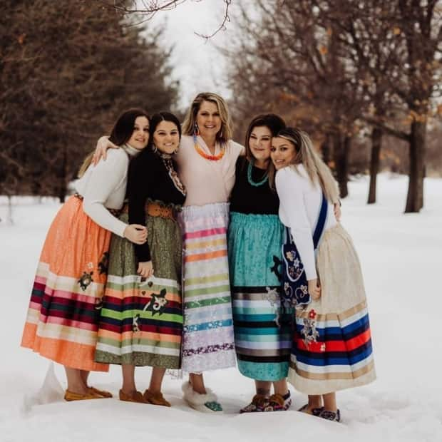 Karen Francis and her daughters are the faces behind K.francisbrand, a modern jewelry business in Akwesasne.   (Kelsey Lindsay Photography - image credit)