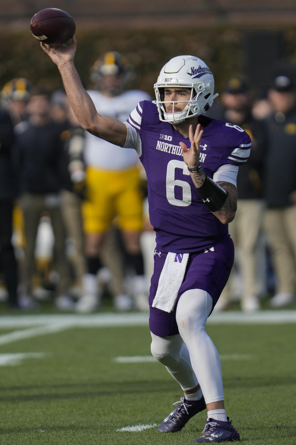 Northwestern quarterback Brendan Sullivan throws a pass during the first half of an NCAA college football game against Iowa, Saturday, Nov. 4, 2023, at Wrigley Field in Chicago. (AP Photo/Erin Hooley)