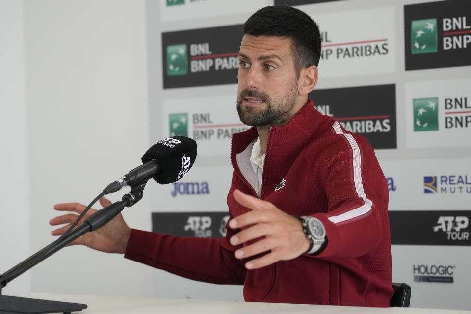 Serbia's Novak Djokovic talks to journalists during a press conference at the Italian Open tennis tournament in Rome, Wednesday, May 8, 2024.(AP Photo/Gregorio Borgia)