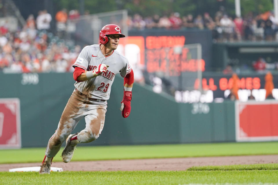 Cincinnati Reds' TJ Friedl runs home while scoring on a single by Elly De La Cruz in the first inning of a baseball game against the Baltimore Orioles, Wednesday, June 28, 2023, in Baltimore. (AP Photo/Julio Cortez)