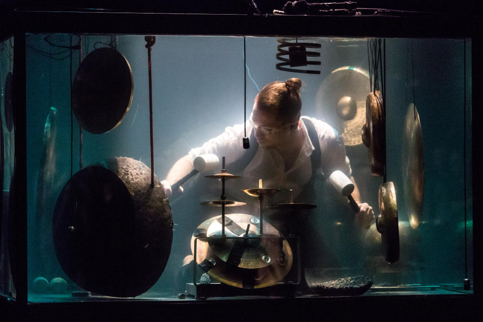 Drummer Morten Poulsen performs underwater ahead of a performance of AquaSonic at Hong Kong's New Vision Arts Festival, Oct. 25, 2018.