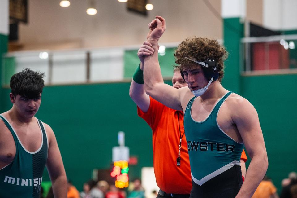 Brewster's Ryan Brace, right, wins his match against Minisink Valley's Timmy Duke in the 215 pound weight class during Eastern States Classic wrestling at SUNY Sullivan in Loch Sheldrake, NY on Friday, January 12, 2024. KELLY MARSH/FOR THE JOURNAL NEWS