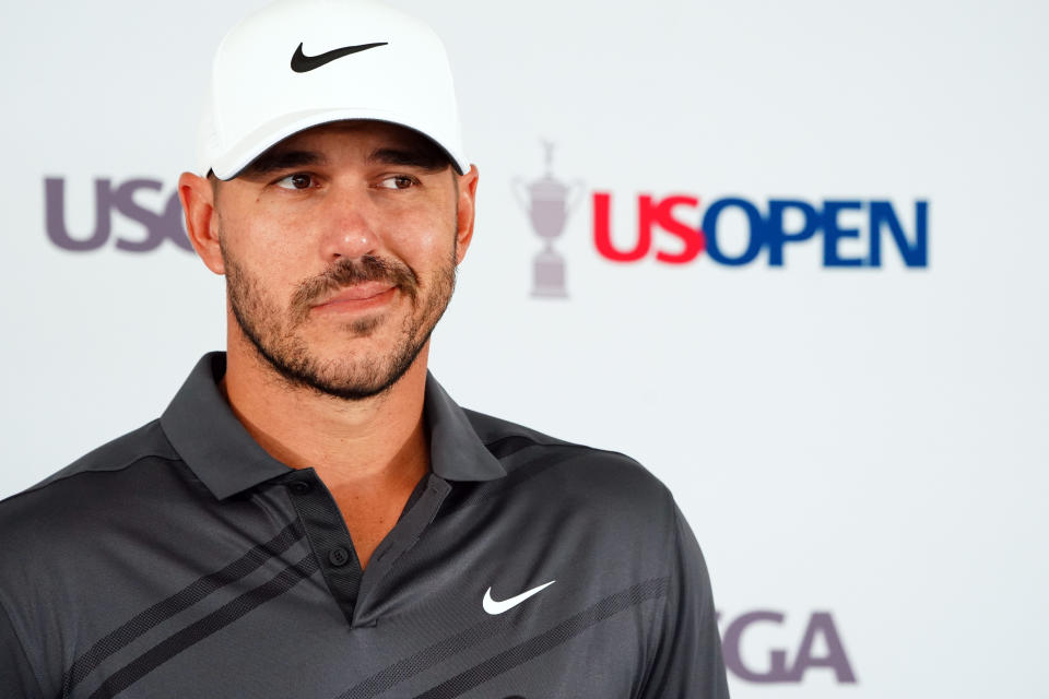 Brooks Koepka addresses the media during a press conference for the U.S. Open golf tournament at The Country Club. Mandatory Credit: John David Mercer-USA TODAY Sports