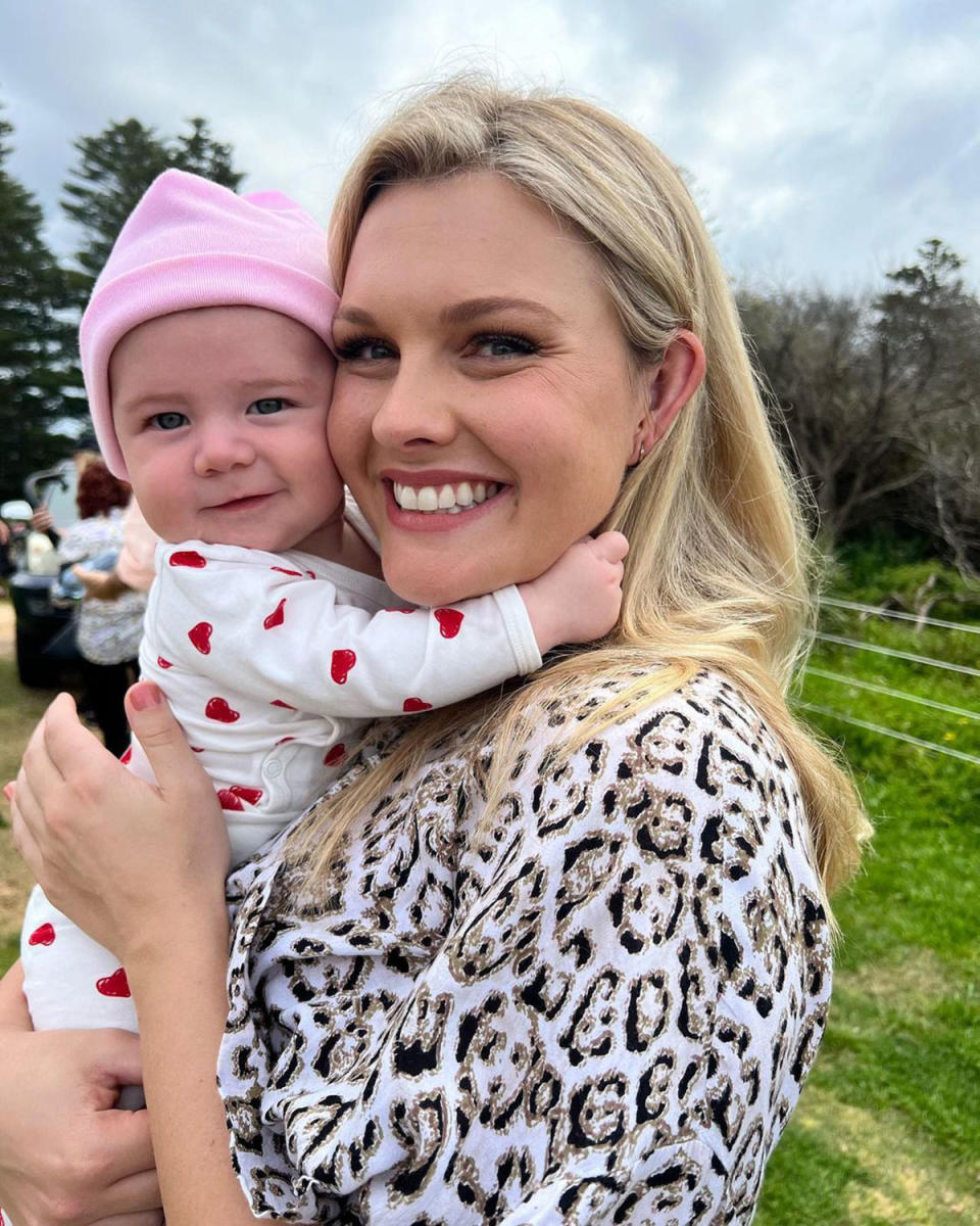Sophie Dillman with a baby on Home and Away