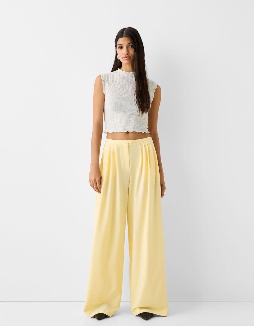 <p><a href="https://go.redirectingat.com?id=74968X1596630&url=https%3A%2F%2Fwww.bershka.com%2Fus%2Fpleated-tailored-wide-leg-pants-c0p153857321.html%3FcolorId%3D300%26gad_source%3D1%26gclid%3DCjwKCAjwl4yyBhAgEiwADSEjeIz9o9ONKrxX50xQpvSR9aqlTNuCcJoy1PtSIW6qyg0lzd_KSwKhHhoCS8MQAvD_BwE&sref=https%3A%2F%2Fwww.cosmopolitan.com%2Fstyle-beauty%2Ffashion%2Fa60792847%2Fwide-leg-pant-outfits%2F" rel="nofollow noopener" target="_blank" data-ylk="slk:Shop Now;elm:context_link;itc:0;sec:content-canvas" class="link ">Shop Now</a></p><p>Pleated tailored wide-leg pants</p><p>bershka.com</p><p>$49.90</p><span class="copyright">Bershka</span>