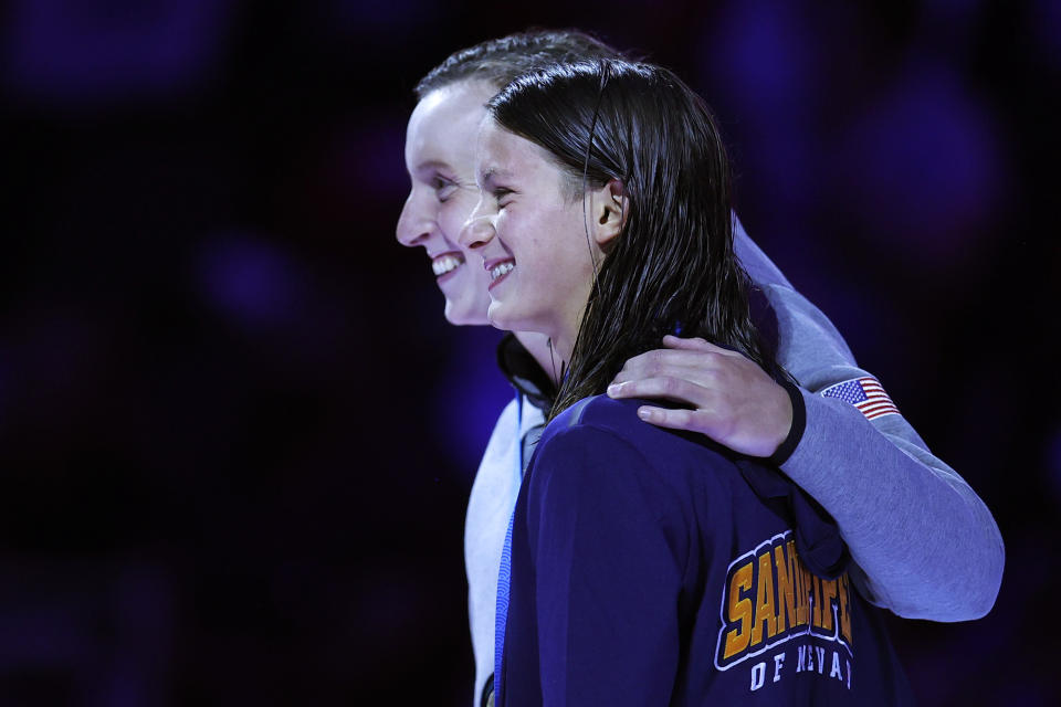 OMAHA, NEBRASKA - JUNE 19: Katie Ledecky and Katie Grimes react during the Women’s 800m freestyle medal ceremony during Day Seven of the 2021 U.S. Olympic Team Swimming Trials at CHI Health Center on June 19, 2021 in Omaha, Nebraska. (Photo by Maddie Meyer/Getty Images)