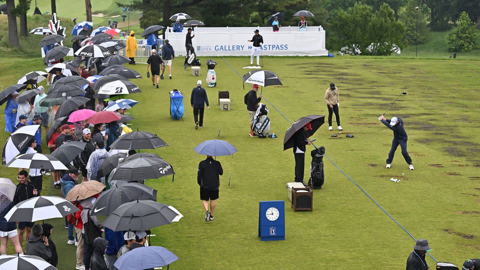 Drizzling rain made for a damp final round. - Minas Panagiotakis/Getty Images