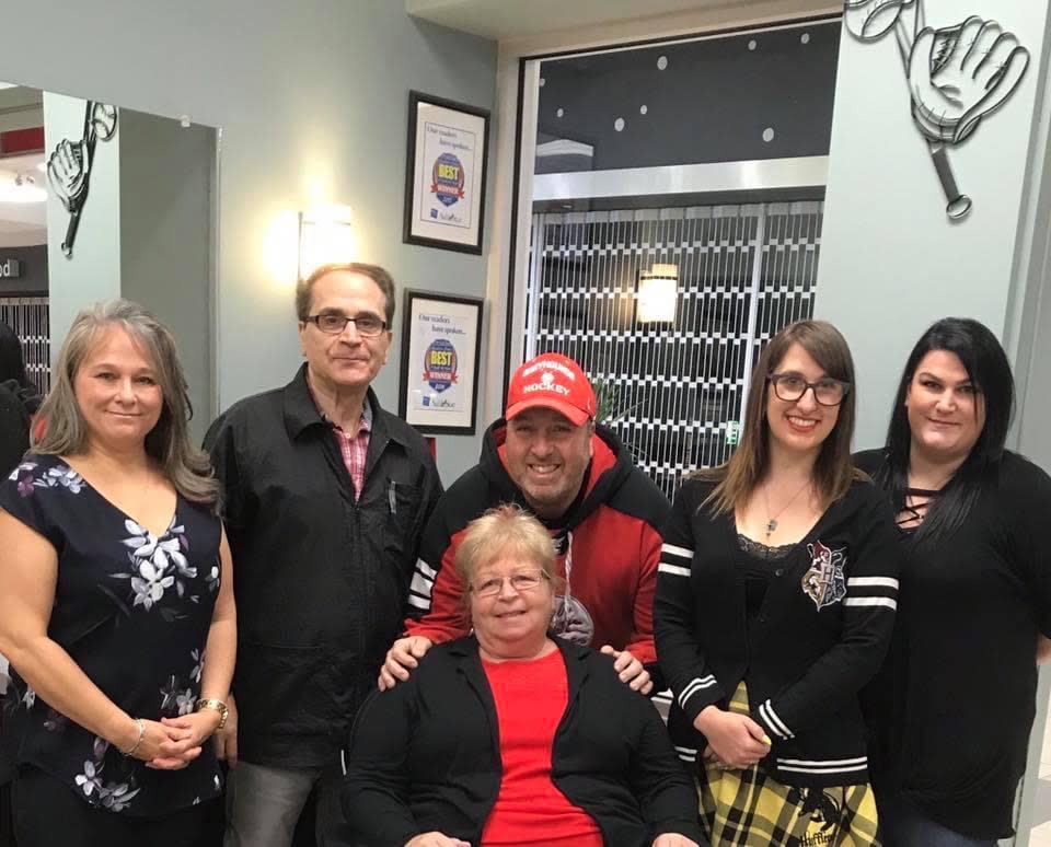 A group shot of the Oscar and Dario team circa 2016. This group includes long-time employee Lori Pavoni, former owner Dario Siciliano, current owners John and Monic Cvengros, and staff Jamie Garcide and Courtney Larocques.