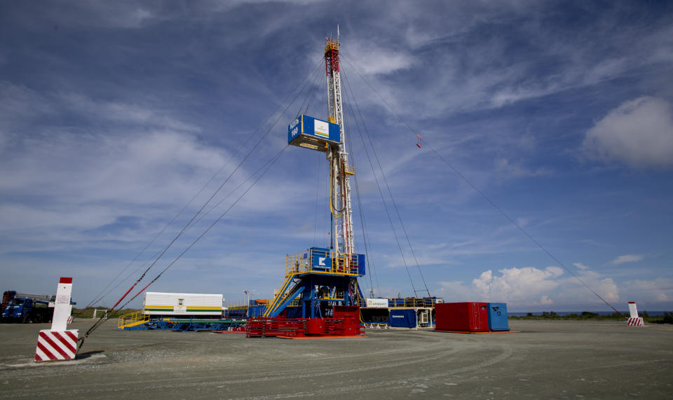 A Russian oil well operates off the coast of Boca de Jaruco, Cuba, Friday, Oct. 4, 2019. Russia is making no secret of its desire to play reliable partner to an island facing hostility from the United States, including sanctions on ships bringing oil from Venezuela. (AP Photo/Ismael Francisco)