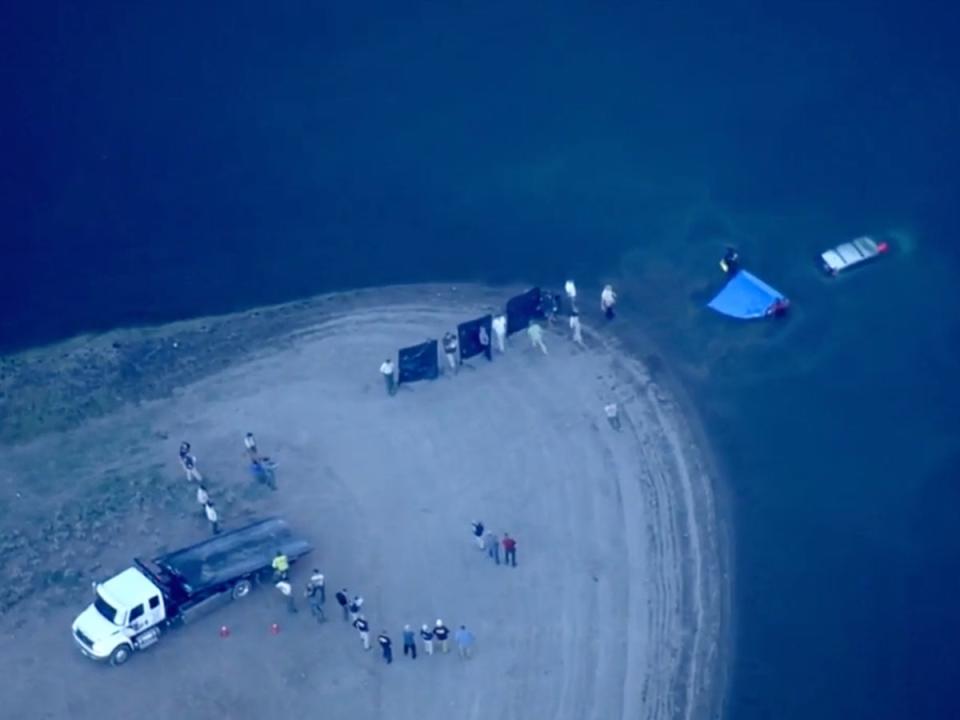 Helicopters for KCRA-TV pictured the vehicle being retrieved from the Prosser Creek Reservoir (KCRA)