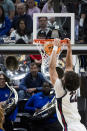 Gonzaga forward Anton Watson (22) dunks against McNeese State during the first half of a first-round college basketball game in the NCAA Tournament in Salt Lake City, Thursday, March 21, 2024. (AP Photo/Isaac Hale)