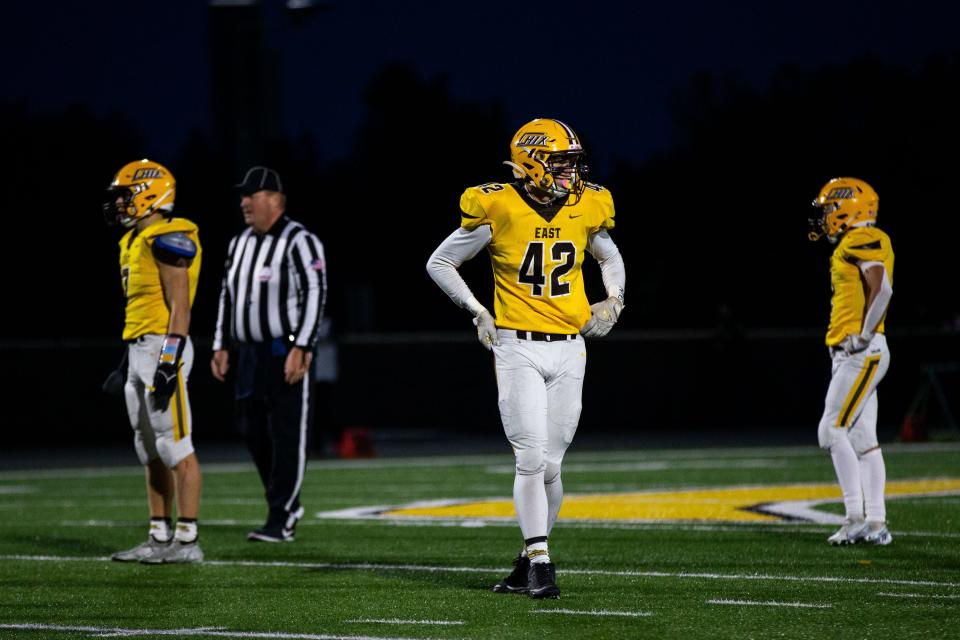 East's Evan Berghorst looks to the sideline during a first quarter series Friday, Oct. 14, 2022, at Zeeland East High School. 