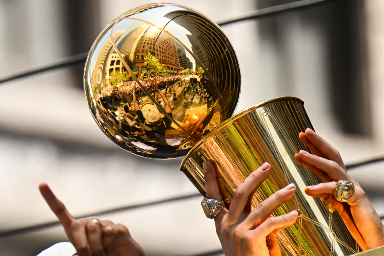 We're here to help you on the path to holding a trophy at the end of your fantasy basketball season. (Photo by Patrick T. FALLON / AFP) (Photo by PATRICK T. FALLON/AFP via Getty Images)