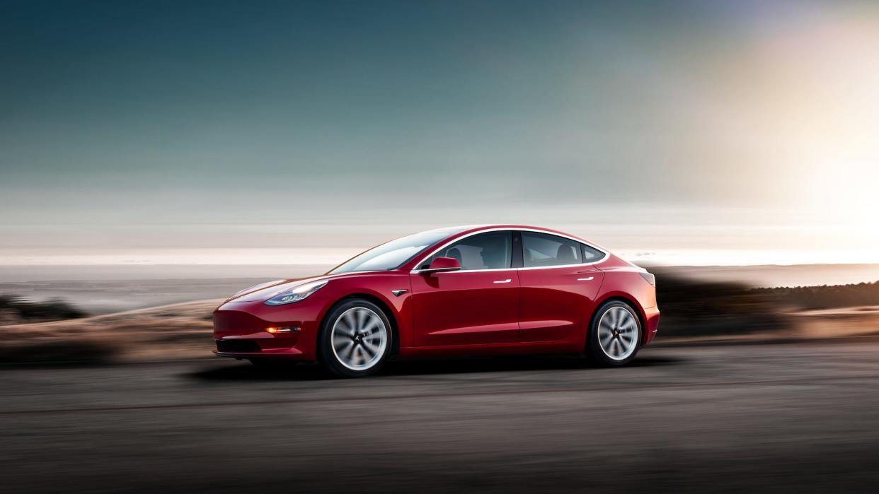 Tesla Model 3   Red Driving Sunset
