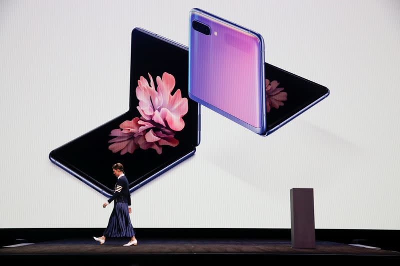 Rebecca Hirst of Samsung Electronics unveils the Z Flip foldable smartphone during Samsung Galaxy Unpacked 2020 in San Francisco