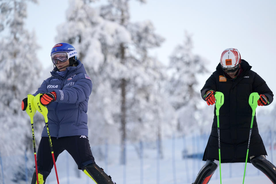 United States' Mikaela Shiffrin, left, and Slovakia's Petra Vlhova during the reconnaissance of the course during the first run of an alpine ski World Cup women's slalom race, in Levi, Finland, Saturday, Nov. 11, 2023. (AP Photo/Giovanni Auletta)