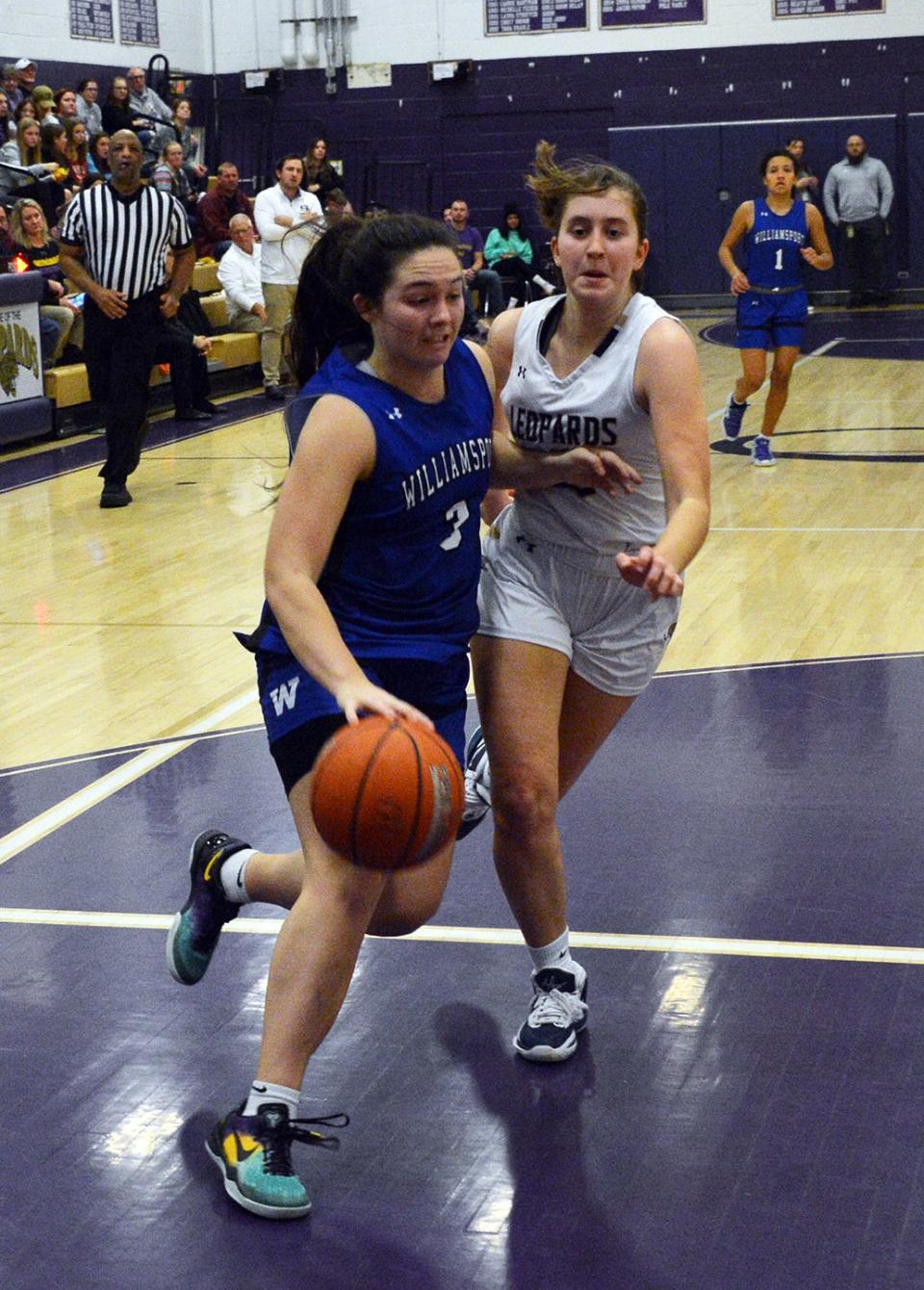 Williamsport senior Paige Smith drives past Smithsburg senior Adriana Miller during a girls basketball game at Smithsburg on Jan. 30, 2023. Smith scored 31 points and the undefeated Wildcats beat the Leopards, 47-25.