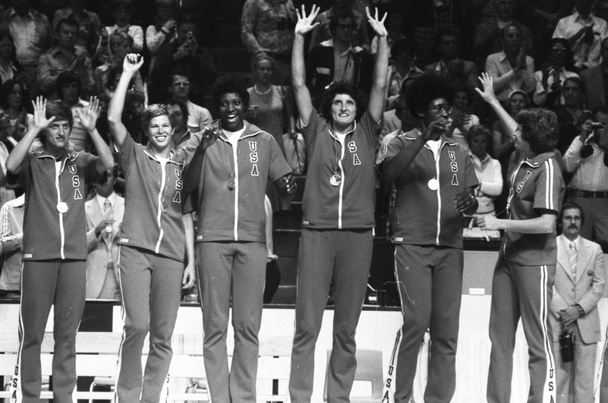 United States Olympic women's basketball team waves after they won the silver medal.  (Photo by Bettmann Archive/Getty Images)