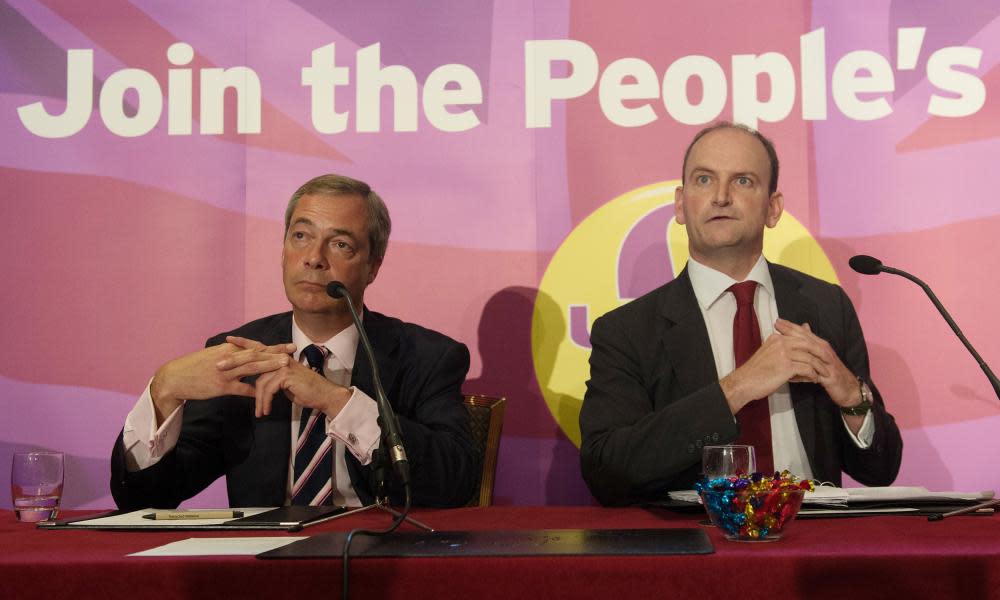 A feud between Nigel Farage, left, and Douglas Carswell reached new heights over claims the MP helped to block a knighthood for the former Ukip leader. 
