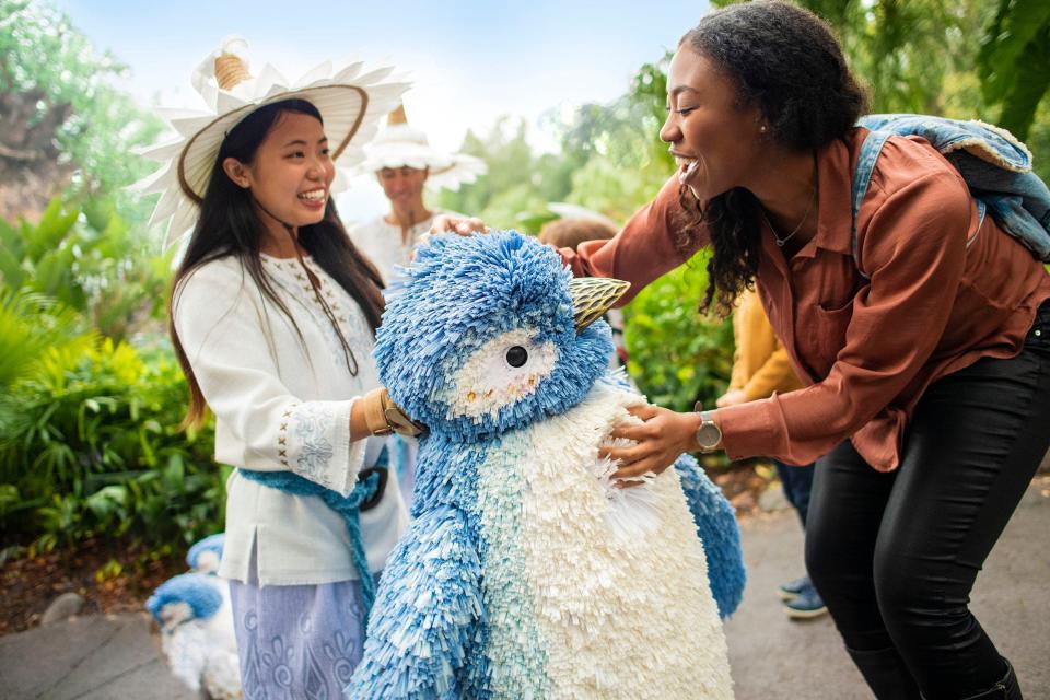 Arctic animals puppets charm guests as part of Disney's Animal Kingdom Merry Menagerie during the holidays.