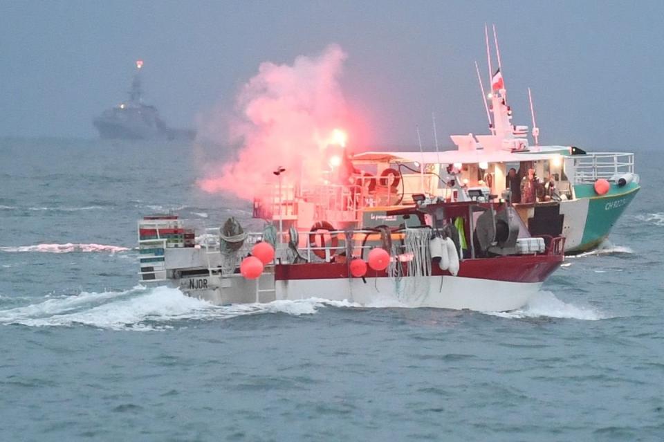 <p>A French vessel sets off a flare</p> (Jersey Evening Post / SWNS)