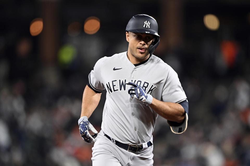 New York Yankees' Giancarlo Stanton trots the bases after hitting a solo homer against the Baltimore Orioles in the fifth inning of a baseball game on Saturday, April 8, 2023, in Baltimore. (AP Photo/Gail Burton)