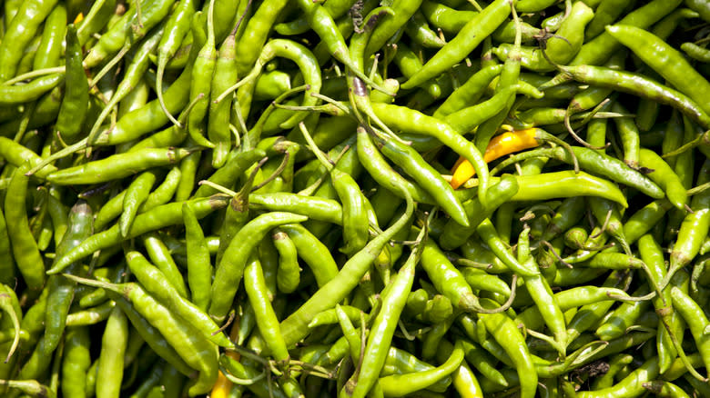 a pile of green chiles