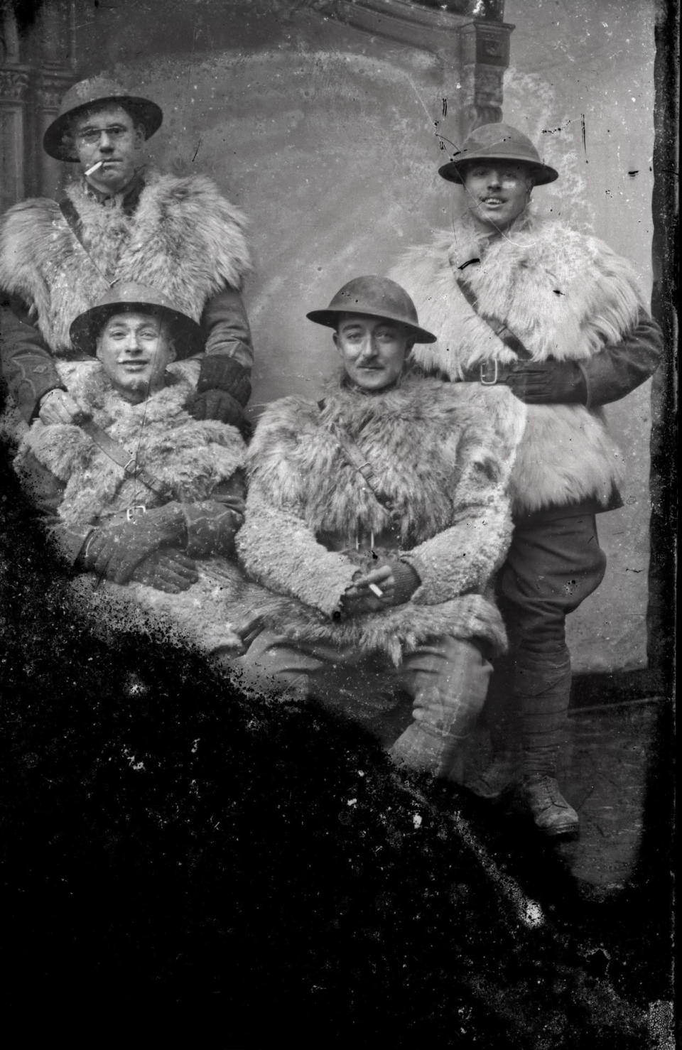 <p>Four soldiers have their photo taken in their winter fur vests. (Courtesy Kerry Stokes Collection, The Louis and Antoinette Thuillier Collection) </p>