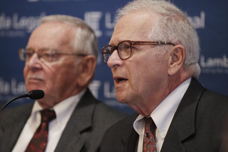 Jim Darby and Patrick Bova, a couple for the last 48 years, tell their story during a news conference Wednesday, May 30, 2012, in Chicago. More than two dozen gay Illinois couples who say it’s unconstitutional for the state to deny them the right to marry and will file two lawsuits Wednesday, a move advocates believe could lead to legalized gay marriage in Illinois. The two lawsuits, filed by attorneys with the American Civil Liberties Union of Illinois and New-York based gay advocacy group Lambda Legal, include couples from Chicago and its suburbs, Bloomington and Marion. (AP Photo/M. Spencer Green)