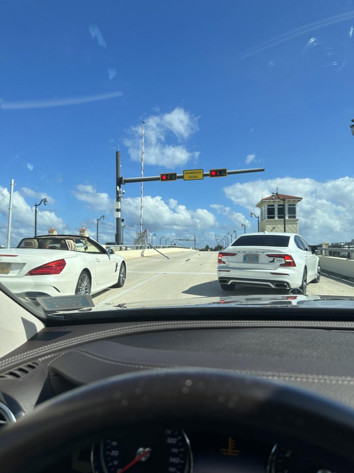 Witnesses were left stunned Monday when an SUV speeding westward along the Flagler Memorial Bridge smashed through the gates.