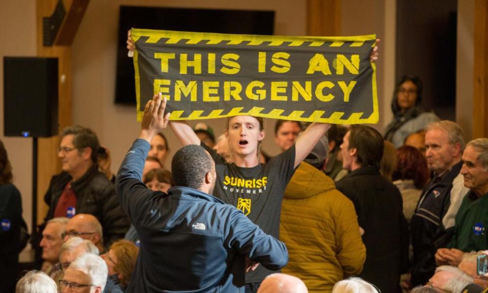 Climate change protesters disrupt former vice-president Joe Biden during a campaign event on 9 October 2019 in Manchester, New Hampshire.