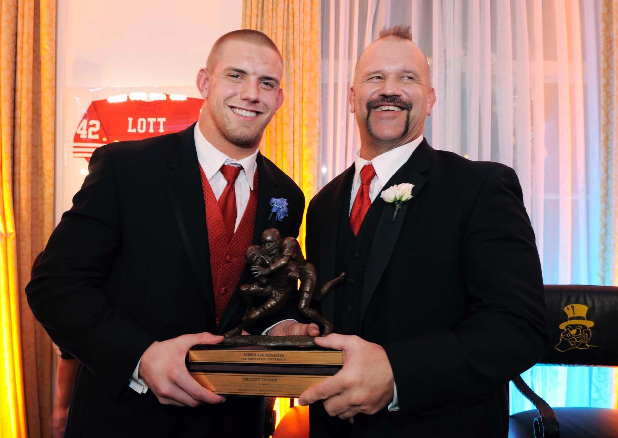 Wrestler Joe Laurinaitis (right, here with his son James) famous for his years in the WWE as the Road Warrior Animal, died on Sept. 23, 2020; he was 60. A cause of death was not given. Laurinaitis’ career began in the 1980s and he was a member of the famed tag teams Road Warriors and Legion of Doom.