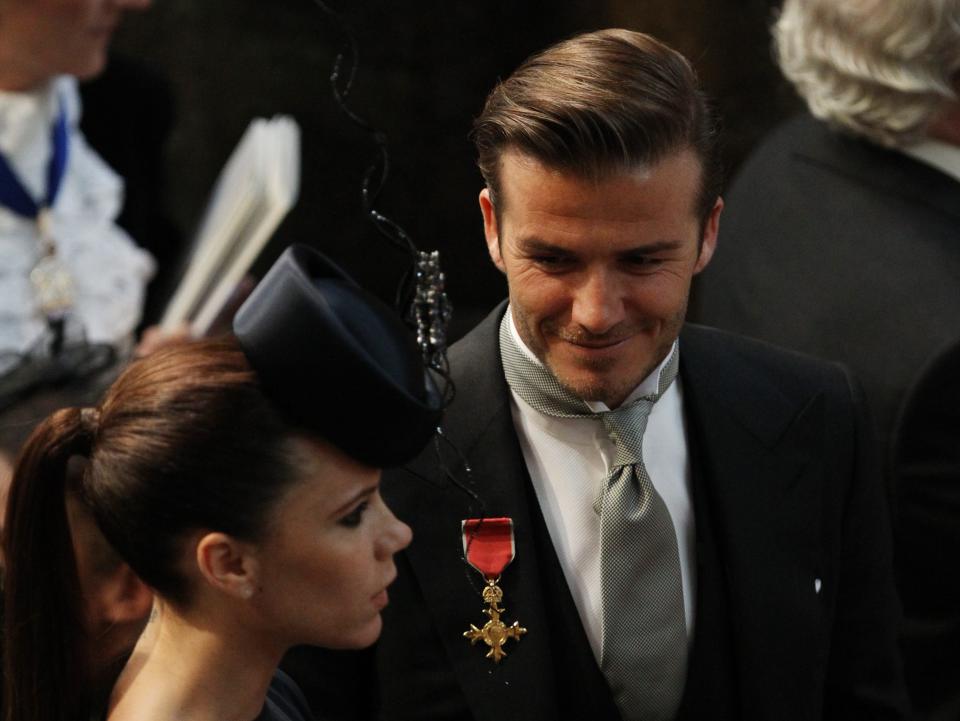 David Beckham and Victoria Beckham arrive at Westminster Abbey on April 29, 2011 in London, England for Prince William and Kate Middleton's wedding.