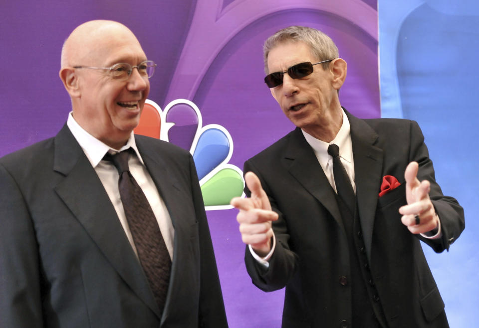 FILE - Actors Dann Florek, left, and Richard Belzer from "Law & Order: SVU" attend the NBC Network 2013 Upfront at Radio City Music Hall, Monday, May 13, 2013, in New York. Belzer, the longtime stand-up comedian who became one of TV's most indelible detectives as John Munch in “Homicide: Life on the Street” and “Law & Order: SVU,” has died at age 78. Belzer died Sunday, Feb. 19, 2023, at his home in Bozouls in southern France, his longtime friend Bill Scheft told The Hollywood Reporter. (Photo by Evan Agostini/Invision/AP, File)