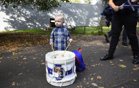 A boy drums during a pro-Union rally in Edinburgh, Scotland September 13, 2014. REUTERS/Dylan Martinez