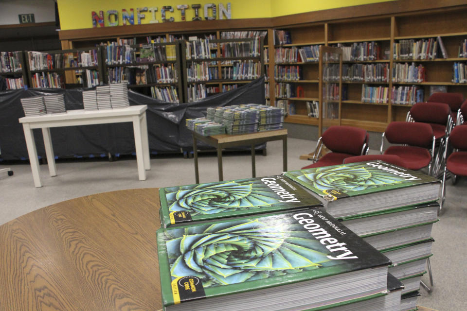 This June 14, 2019, photo shows the library at Wasilla Middle School in Wasilla, Alaska, that would be available to lawmakers. Alaska Gov. Mike Dunleavy has called lawmakers into special session in Wasilla beginning July 8, but some lawmakers have expressed concerns over security and logistics with the location more than 500 miles from the state capital of Juneau, Alaska. (AP Photo/Mark Thiessen)