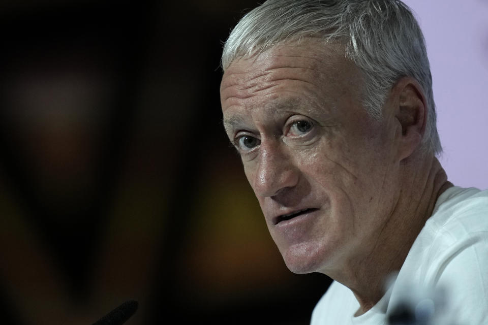 France's head coach Didier Deschamps answers questions during a press conference in Doha, Qatar, Saturday, Dec. 17, 2022 on the eve of the World Cup final soccer match between France and Argentina. (AP Photo/Christophe Ena)