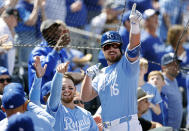 Kansas City Royals' Hunter Renfroe (16) celebrates after his two-run home run with Bobby Witt Jr., left, during the fifth inning of a baseball game against the Chicago White Sox in Kansas City, Mo., Sunday, April 7, 2024. (AP Photo/Colin E. Braley)