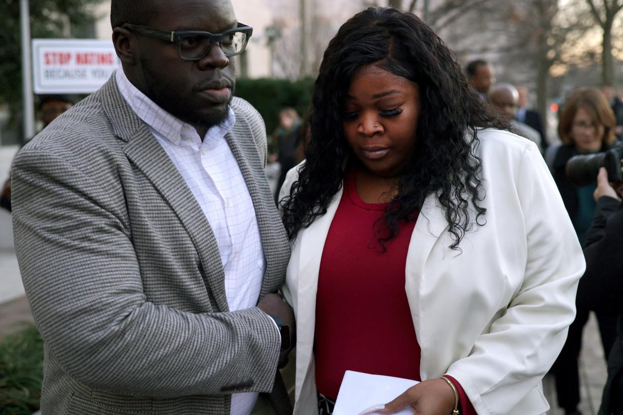 Georgia election worker Shaye Moss (R) leaves the E. Barrett Prettyman U.S. District Courthouse on Dec. 15, 2023 in Washington, D.C. A jury has ordered Rudy Giuliani, the former personal lawyer for former President Donald Trump, to pay $148 million in damages to the two Fulton County election workers, Moss and her mother Ruby Freeman.