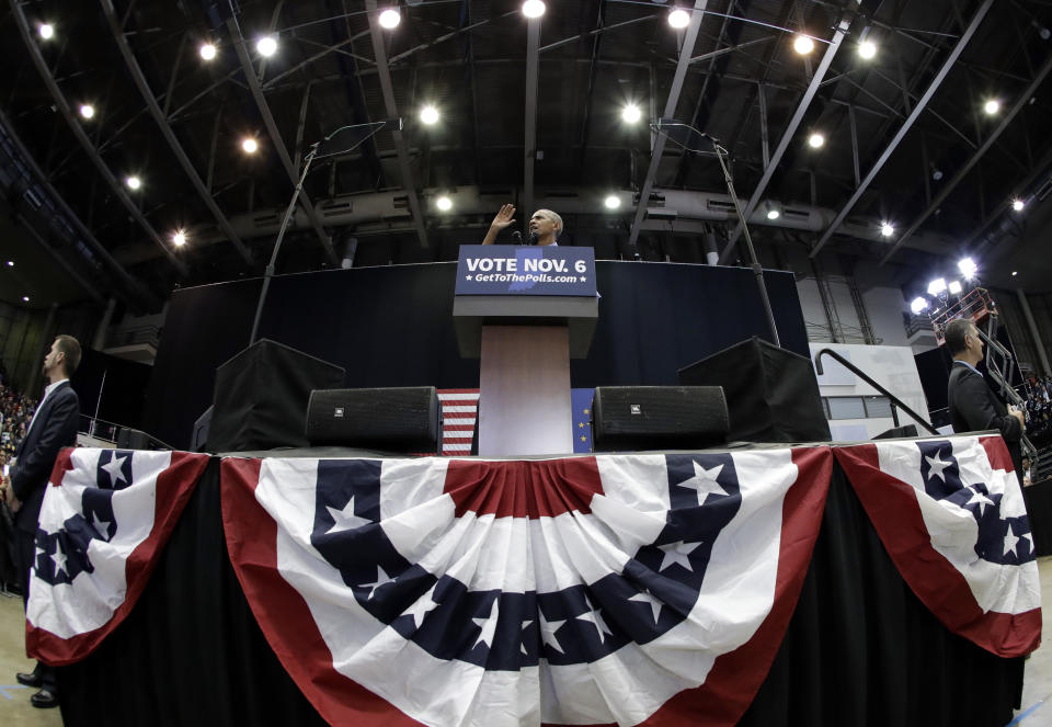 CORRECTS TO SAY THAT DONNELLY IS A CONGRESSIONAL CANDIDATE, NOT A GUBERNATORIAL CANDIDATE - Former President Barack Obama speaks during a rally to support Indiana Democratic congressional candidate U.S. Sen. Joe Donnelly at Genesis Convention Center in Gary, Ind., Sunday, Nov. 4, 2018. (AP Photo/Nam Y. Huh)