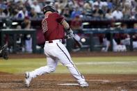 Arizona Diamondbacks' Daulton Varsho connects for a three-run home run against the Detroit Tigers during the sixth inning of a baseball game Sunday, June 26, 2022, in Phoenix. (AP Photo/Ross D. Franklin)