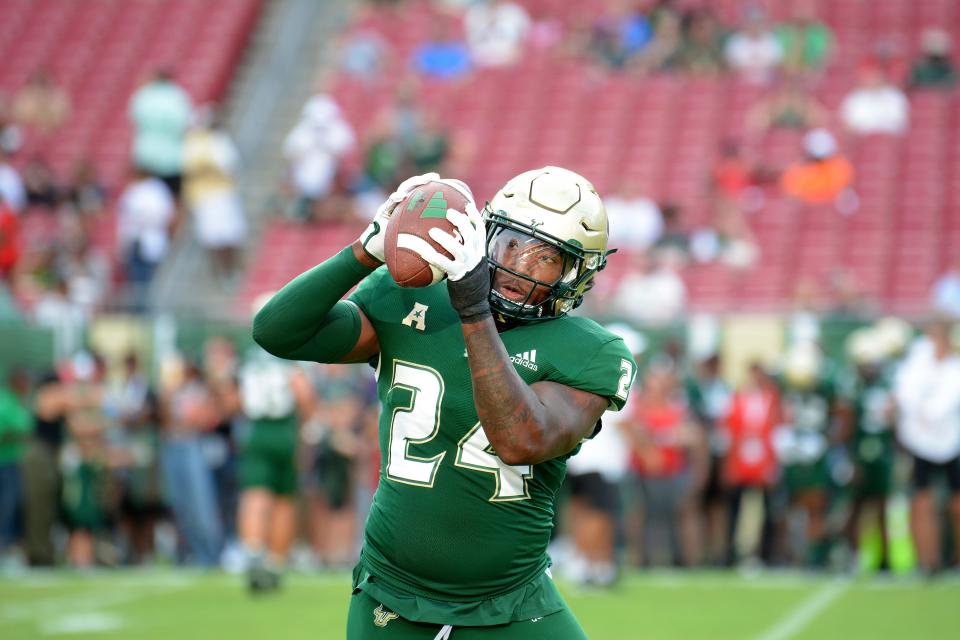 University of South Florida's Mac Harris (24) makes a catch during an NCAA football game on Saturday, Sept. 9, 2023, in Tampa.