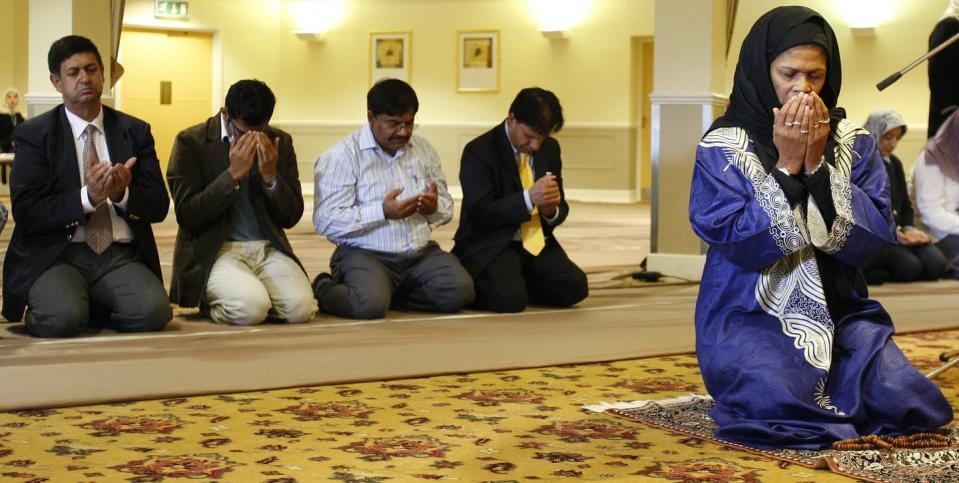 Muslim woman leading a Friday prayer.