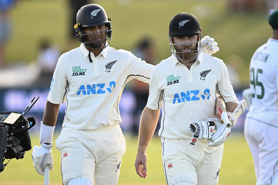 New Zealand's not out batsmen, Rachin Ravindra, left, and Kane Williamson walk from the field at close of play on the first day of the first cricket test between New Zealand and South Africa at Bay Oval, Mt Maunganui, New Zealand. Sunday Feb. 4, 2024. (Photo: Andrew Cornaga/Photosport via AP)