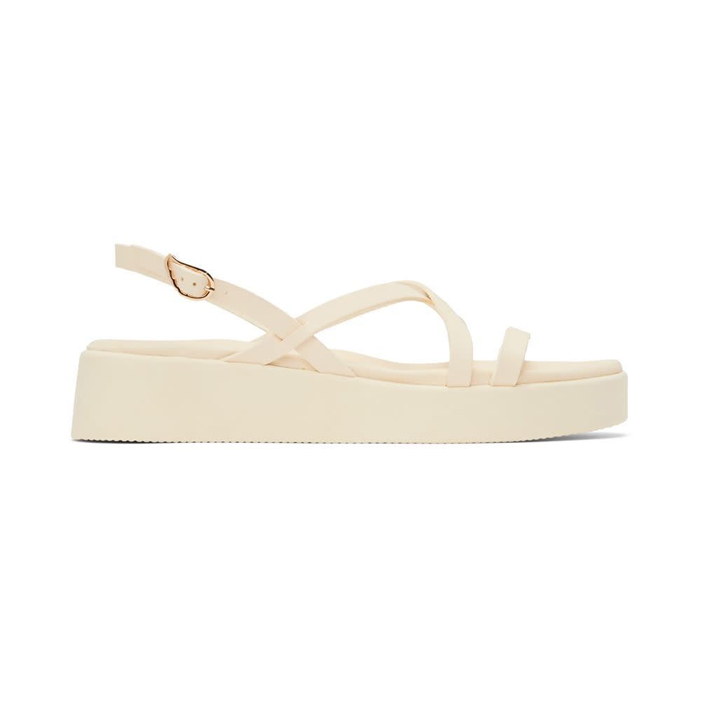 <p><a href="https://go.redirectingat.com?id=74968X1596630&url=https%3A%2F%2Fwww.ssense.com%2Fen-us%2Fwomen%2Fproduct%2Fancient-greek-sandals%2Fwhite-silia-flat-sandals%2F13265911&sref=https%3A%2F%2F" rel="nofollow noopener" target="_blank" data-ylk="slk:Shop Now;elm:context_link;itc:0;sec:content-canvas" class="link rapid-noclick-resp">Shop Now</a></p><p>White Silia Flat Sandals</p><p>$255.00</p><p>ssense.com</p>