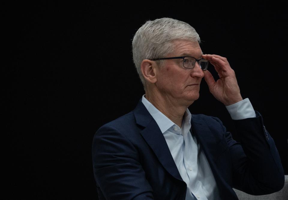 Apple CEO Tim Cook watches a conversation about mental health during a match show on the final day of Asia-Pacific Economic Cooperation (APEC) Leaders Week at Apple Park on November 17, 2023 in San Francisco, California.  (Photo: ANDREW CABALLERO-REYNOLDS / AFP) (Photo: ANDREW CABALLERO-REYNOLDS/AFP via Getty Images)