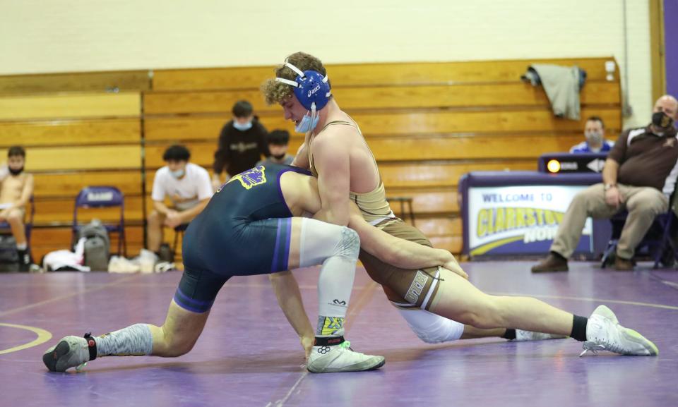 Clarkstown South's Greg Casvikes defeats Clarkstown North's Seth Frendel in a 132-pound match during a dual meet at Clarkstown North High School in New City on Thursday, January 27, 2022.  Clarkstown South won the meet 41-30.
