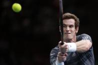 Andy Murray of Britain returns a shot during his men's singles tennis match against Grigor Dimitrov of Bulgaria in the third round of the Paris Masters tennis tournament at the Bercy sports hall in Paris, October 30, 2014. REUTERS/Benoit Tessier